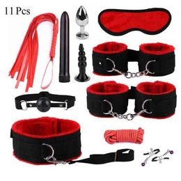 Nxy Bondage Bdsm 11pcs Set Leather Sex Toys for Adult Game Erotic Kits Handcuffs Whip Gag Sm Nipple Clamps 220419