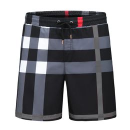 Calças casuais para homens calças de praia verão moda shorts masculinos estilo solto jeans de cor xadrez tamanho grande