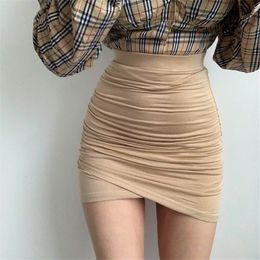 XIABNI High waist pleated bandage short skirt female sexy street party tight elastic Mini wrap hip skirt irregular apricot 210331