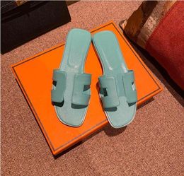 top quality new women Beach slippers Summer fashion temperament woman flip flops leather lady Metal shoes Flat Ladies slide