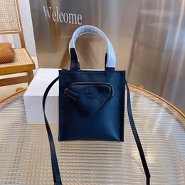 High quality Classic Small square bags packets of nylon tofu women's 2022 early spring fashion leisure One Shoulder Messenger Handbag lock bag Colour matching Totes