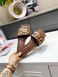 Slippers Leather slides peep-toe slippers are decorated with brands signature horse buckle accessories Double-ring elongated designs run through Q240520