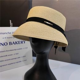 Chapéus largos de chapéus femininos Big Beach Praia protetora solar chapéu de balde palha luxuoso solar arco preto arco dobrável hatwide do sol