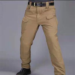 Мужские брюки военные тактические специальные боевые брюки много карманные водонепроницаемые износостойкие.
