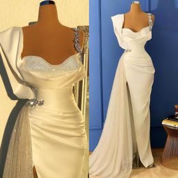 2022 Elegant White Sequin Prom Dresses Spaghetti Straps Mermaid Sexy Backless Sleeveless Evening Gowns Vintage Arabic Party Dress BC13092