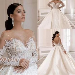 Ny ankomst Luxury Arabiska Dubai Pärlor Kristaller Bollkakor Bröllopsklänningar 2022 Vestido de Noiva Soft Sheer Tulle Långärmad Baklösa Bröllop Bröllopklänningar