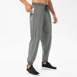 Gym Leggings Men's Loose Sports Pants Watertproof Zipper Pocket Joggers Snabbtorkande byxor
