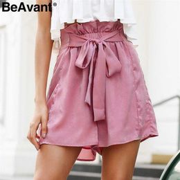 BeAvant Ruffle bow tie up summer shorts women Chic pink loose streetwear shorts femme Casual beach elastic high waist shorts 210709