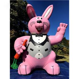 Holiday decoration giant inflatable Easter Bunny pink rabbit model with carrot for outdoor roof top promotional