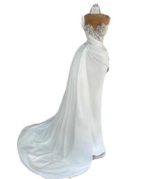 Sexy African Mermaid Wedding Dresses High Neck Illusion Sleeveless Lace Appliques Pearls Crystal Sheer Sweep Train Backless Plus Size Bridal Gowns