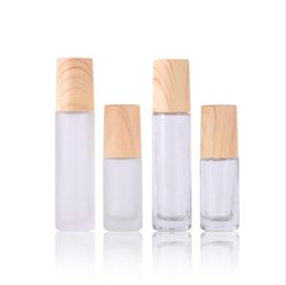 Frosted Clear Glass Roller Bottles 5ml 10ml Roll on Bottle with Metal Roller Ball Wood Grain Plastic Lids for Perfume Essential Oil Lip Balms