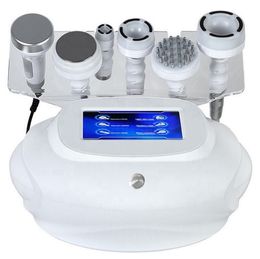 High Quality Multifunctional beauty Slim Equipment Ultrasonic Cavitation Radio Frequency RF Vacuum Skin Care Massager Slimming Machine