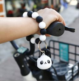 Wholesales Fashionable accessories K68416 New cartoon cute panda bracelet keychain PVC silicone beaded wrist bear doll key ring