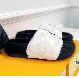 POOL PILLOW COMFORT MULES Slippers These luxurious shoes are made from soft mink for instant warmth The wide front straps patterned with contrasting mink inlays