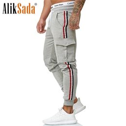 Men Autumn New Pockets Joggers Casual Pants Sportswear Tracksuit Bottoms Skinny Sweatpants Trousers Gyms Track Pants Men 201118