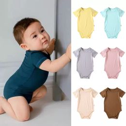 Abiti firmati per bambini Pagliaccetti per neonati Ragazze Tute solide in fibra di bambù Estate Casual Boutique Tute lunghe a maniche corte Triangolo appena nato Vestiti da arrampicata