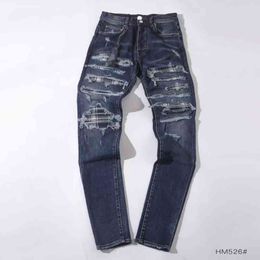 Jeans firmati di vendita caldi Tide Brand A 22 miri Pantaloni strappati retrò di alta qualità nei nuovi pantaloni sportivi sportivi da uomo larghi di strada americana Hip Hop DR5