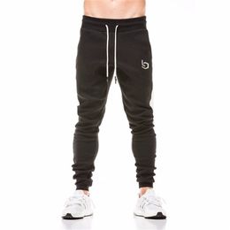 High Quality Jogger Pants Men Fitness Bodybuilding Gyms Pants For Runners Brand Clothing Autumn Sweat Trousers Britches LJ201103