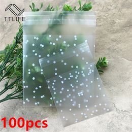 100pcs Plastic Transparent Cellophane Polka Dot Candy Cookie Gift Bag with DIY Self Adhesive Pouch Celofan Bags for Party 220704