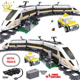 HUIQIBAO 641pcs Battery Power Electric City Train High Speed Rail Building Blocks Railway Track Set Brick Children Toy 220715