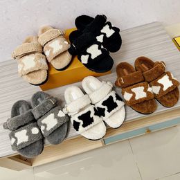 PASEO FLAT COMFORT MULES Slippers This winter interpretation features fluffy shearling for instant warmth and softness Wide front straps with contrasting logo