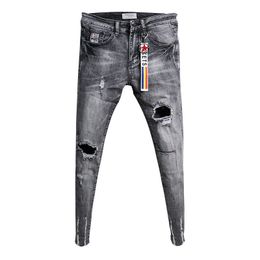Whole Fashion Casual teenagers cowboy Korean trendy knee ripped hole skinny jeans mens raw edge fashion stretch pants 201111230y