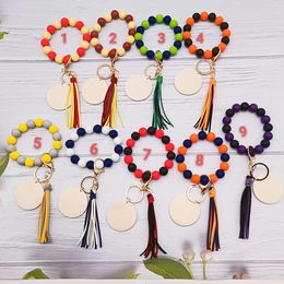 Foreign trade new food grade silicone bead bracelet tassel blank disc keychain wholesale female multi-color optional