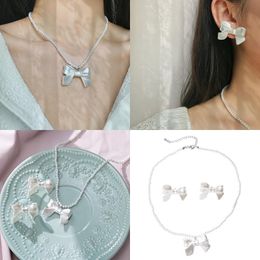 -Luxus Mode Choker Halskette Anhänger Halsketten weiße Schmetterling fällt das Temperament mit kleinem Knochenketten einfacher Perlenschmuck jllrvi