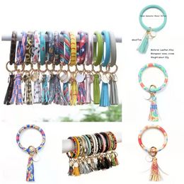 35 Styles Fashion Sun Flower/Flag Pattern key chain Leather Wrap Tassels Bracelets Keychain Wristlet Bracelet Tassel Keychains Round Bangle KeyRing sxjun21