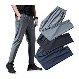 Calças de corrida homens esporte jogging fitness yoga treinamento de basquete futebol longa leggings gelo elástico de seda rápida calça de secagem 220509