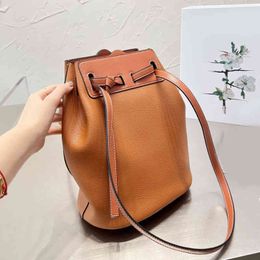 top quality Designer Lychee Drawstring Bucket Ladies Tote Bag Color Matching Handbags Cowhide Drawstring Bucket Casual Lady Shopping Purses