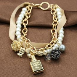 Creative Fashion Women's Bracelets Elegant Perfume Bottle String Pearl Bow Multilayer Bracelet Bracelets Travel Play Wear Bracelet Jewellery