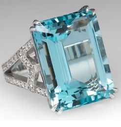 Eheringe exquisite eingelegte Sea Blue Topaz Diamond Prinzessin Ring European Fashion Engagement Überraschung Frau Ringwedding