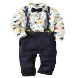 Bebê recém-nascido meninos conjuntos de roupas dinossauros impressão de manga comprida topo romper + Suspender calças + gravata borboleta crianças roupas infantis