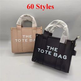 -The Tote Bag 2022 Mujeres Diseñador de moda Bolsos Lady Totes Libro de hombro Crossbody Luxury Luxury Malad Single Package Single Leopard Purse Fold Summer Billets