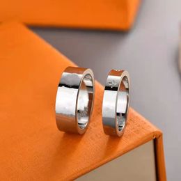 High quality male and female designer rings, hollowed-out letters lovers European and American trend silver black ring