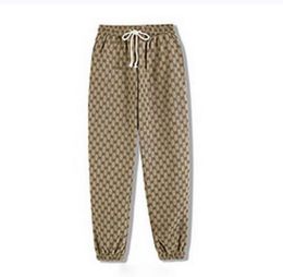 Pantaloni da jogging streetwear Pantaloni da uomo Pantaloni casual Pantaloni fitness da palestra Pantaloni da tuta traspiranti elastici Pantaloni sportivi Pantaloni sportivi