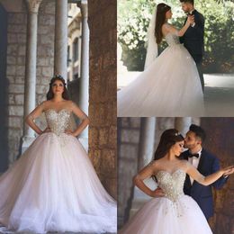 Luxury 2016 Crystal Beads Sheer Neckline Long Sleeve Ball Gown Wedding Dresses Sparkly Tulle Plus Size Chapel Bridal Gowns EN1086