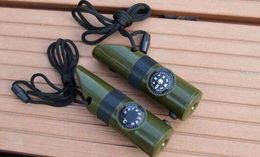 500pcs 7 in 1 Multifunctional Military Survival Kit Magnifying Glass Whistle Compass Thermometer LED Light