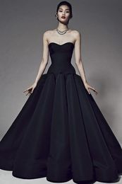 -Einzigartiges schwarzes trägerloses Hochzeits-Kleid eine Linie bodenlanges Abend-Kleid vestido de festa longo Elegantes Abschlussball-Kleid-formales Gelegenheits-Kleid