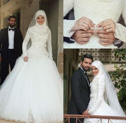 Arabic Dubai Muslim Wedding Dresses 2016 Saudi Arabian Modest High Neck Hijab Wedding Gown Long Sleeves Lace Applique Beaded Bridal Dresses