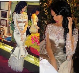 Sparkly Silver Crystals Beaded Prom Dresses 2016 Bateau Illusion Long Sleeve Mermaid Evening Gowns Tulle Floor Length Formal Party Dresses