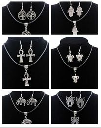 2017 new fashion mix 6 styles Alloy elephant Tree of life Lucky Tree Owl Sea turtle Palm Bianca cross Necklace earring Jewellery set