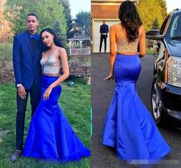 royal blue and gold prom couple