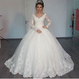 2018 Cheap Modern Arabic Ball Gown Wedding Dresses Long Sleeves V Neck Lace Appliques Puffy Tulle Sweep Train Plus Size Formal Bridal Gowns