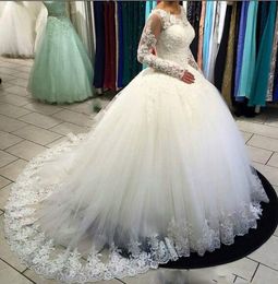 African Long Sleeves Wedding Dresses For Bride Appliques Sheer Neck Ball Gown Wedding Dress Count Train Zipper Arabic Dubai Bridal Gowns