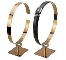 Gold silvery Boutique Man garment store belt showing display rack stand belt holder to show belt