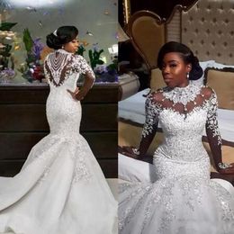 2019 Bling Hochzeitskleid Nigerianische Kleider Stehkragen Illusion Lange Ärmel Kristalle Perlen Pailletten Spitze Applikationen Meerjungfrau Brautkleider