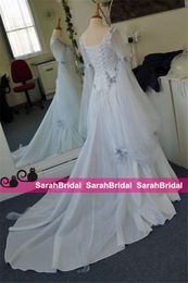2022 Винтажное кельтское свадебное платье Слоновая кость и бледно -голубые красочные средневековые свадебные платья выкапывать корсет с длинными рукавами.