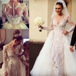 Gorgeous Lace Applique Wedding Dresses With Detachable Train 2017 Sheer Neck Long Sleeve Back Covered Buttons Pearls Beaded Bridal Gowns